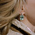 Earrings with beryls and diamonds