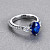 Ring with blue sapphire and diamonds
