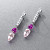 Earrings with pink sapphires, morganites, and diamonds