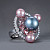 Ring with Tahitian pearl, freshwater pearl, malaya garnets, and diamonds