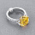Ring with yellow sapphire and diamonds