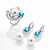 Earrings with South Sea pearls, Cambodian zircons, and diamonds
