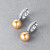 Earrings with golden South Sea pearls and diamonds