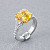 Ring with yellow sapphire and diamonds