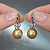Earrings with golden South Sea pearls and diamonds