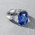 Ring with blue sapphire and diamonds