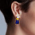 Earrings with a yellow sapphire, tanzanite, and diamonds