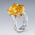 Ring with yellow sapphire and diamonds