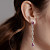 Earrings with zircons, spinels, and diamonds