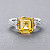 Ring with yellow sapphire and diamonds