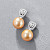 Earrings with golden South Sea pearls and diamonds