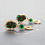 Earrings with trapiche emeralds