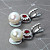 Earrings with South Sea pearls, spinel, and diamonds