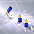 Earrings with yellow sapphires, tanzanites, and diamonds