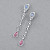 Earrings with sapphires, spinels, and diamonds