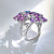 Ring with lavender-pink sapphires and diamonds