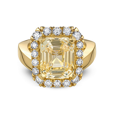 Ring with yellow sapphire and diamonds