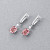 Earrings with orange-pink tourmalines and diamonds