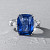 Ring with blue sapphire and diamonds