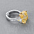 Ring with yellow sapphire and diamonds