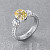 Ring with yellow sapphire and diamonds