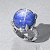 Ring with star sapphire and diamonds
