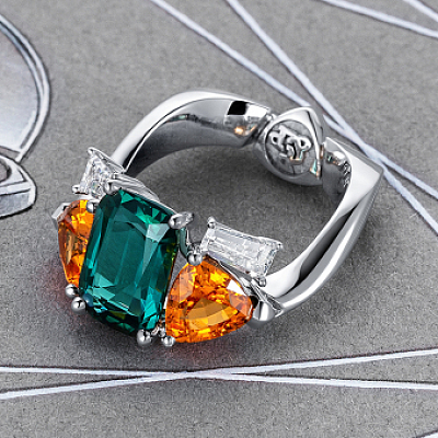 Ring with indigolite, spessartines and diamonds