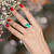 Ring with emerald, rubies, and diamonds