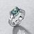 Ring with Teal sapphire and diamonds