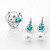 Earrings with South Sea pearls, Cambodian zircons, and diamonds