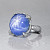 Ring with star sapphire and diamonds
