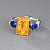 Ring with spessartines, sapphires, and diamonds