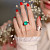 Ring with emerald, rubies, and diamonds
