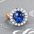 Ring with blue sapphire and diamonds