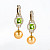 Earrings with golden South Sea pearls, peridots, and diamonds