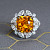 Ring with yellow sapphire and diamonds