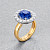 Ring with blue sapphire and diamonds