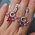 Earrings with spinel, sapphires and diamonds
