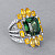 Ring with teal sapphires, yellow sapphires, and diamonds