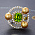 Ring with golden South Sea pearl, peridot, and diamonds