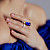Ring with a yellow sapphire, tanzanite, and diamond
