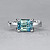 Ring with Teal sapphire and diamonds