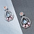 Earrings with Tahitian pearl, freshwater pearl, malaya garnets, and diamonds