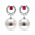Earrings with South Sea pearls, spinel, and diamonds