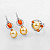 Earrings with golden South Sea pearls, spessartite garnets, and diamonds