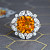 Ring with yellow sapphire and diamonds