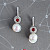 Earrings with South Sea pearls, spinel, and diamonds