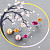 Earrings with spessartine, rubellite, diamonds, freshwater pearls and South Seas gold pearls