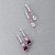 Earrings with spinels, rhodolite garnets, and diamonds