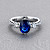 Ring with blue sapphire and diamonds